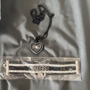 Black Heart Pendant Necklace and Silver Raiders Bracelet